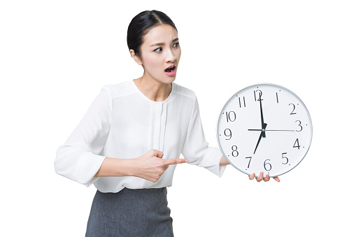 Woman Looking at Clock